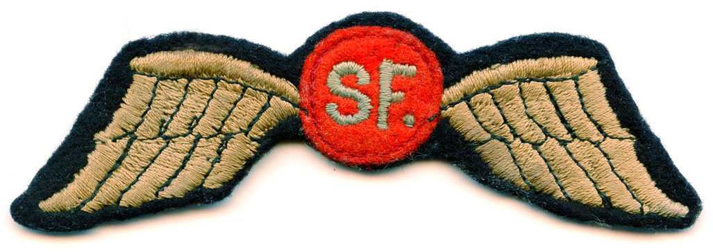 Emblema de brazo que distinguía a los militares de la OSS de los Grupos Operativos. Empiezan a llevar las siglas SF de Special Forces